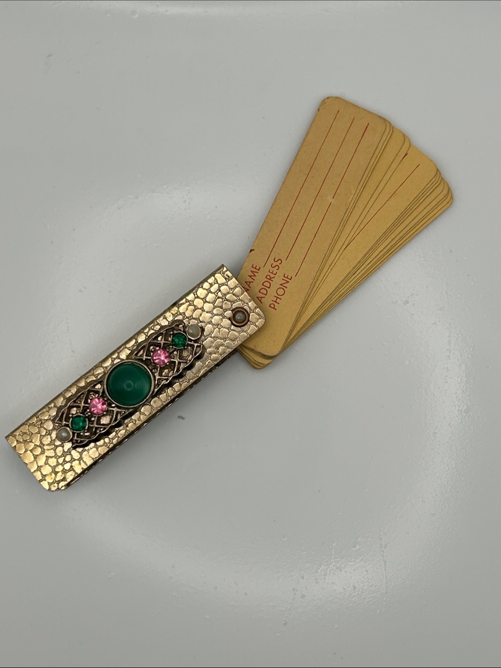 Vintage gold tone fan address book.